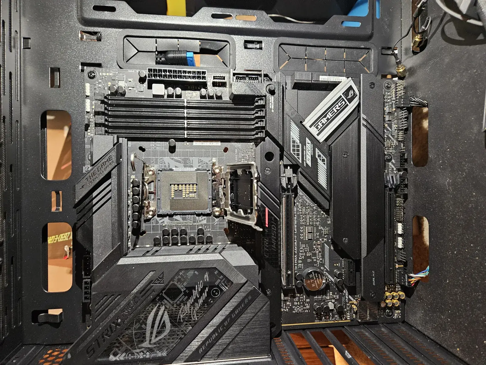 Motherboard and case prepared for a new PC build or repair upgrade